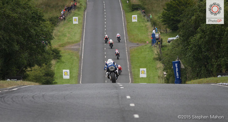 William Dunlop chases the leaders in the main Superbike race
